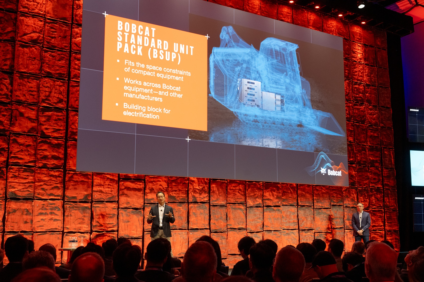 Scott Park (left), CEO of Doosan Bobcat, explains BSUP(Bobcat Standard Unit Pack) at CES 2026 Media Day on January 5 